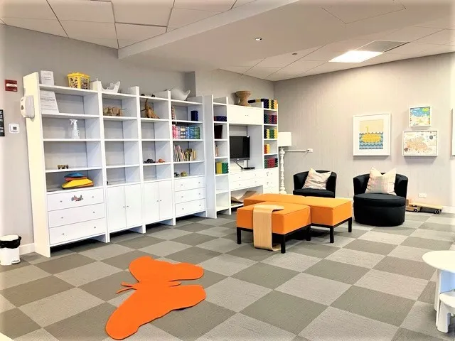 a bed room with two beds and a walk in closet