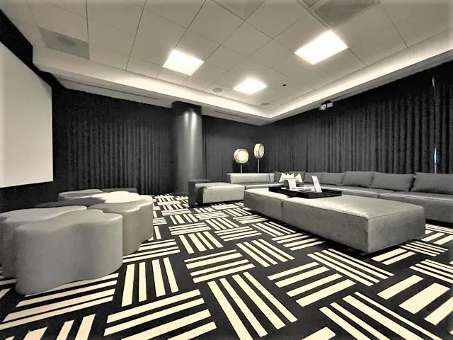 a front view of a room with furniture