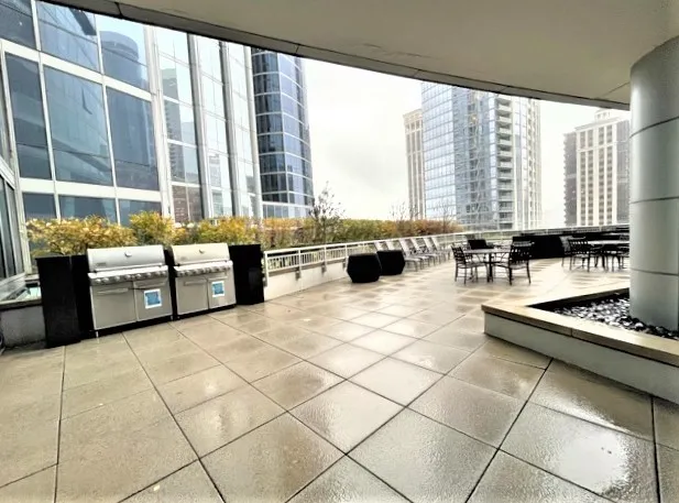 a view of wooden floor and windows in a room