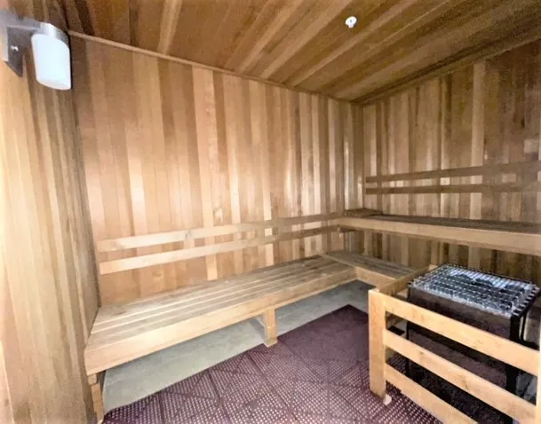 a bathroom with a bathtub and shower