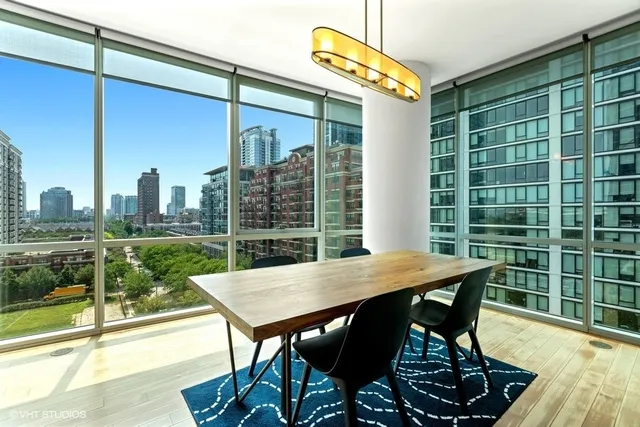 a view of a patio with a table chairs and a table