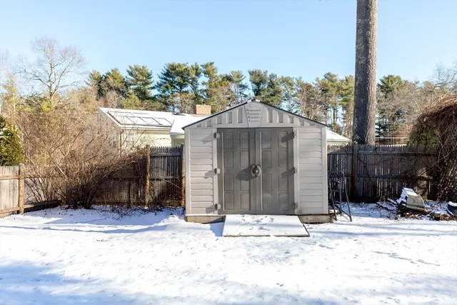 a house with trees in the background