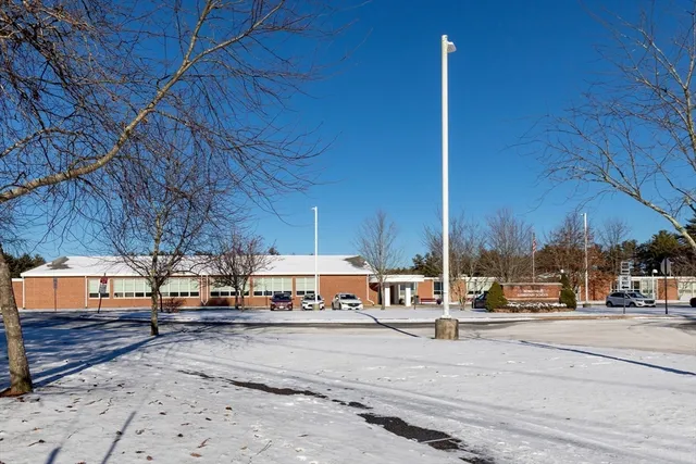 a view of a street with cars