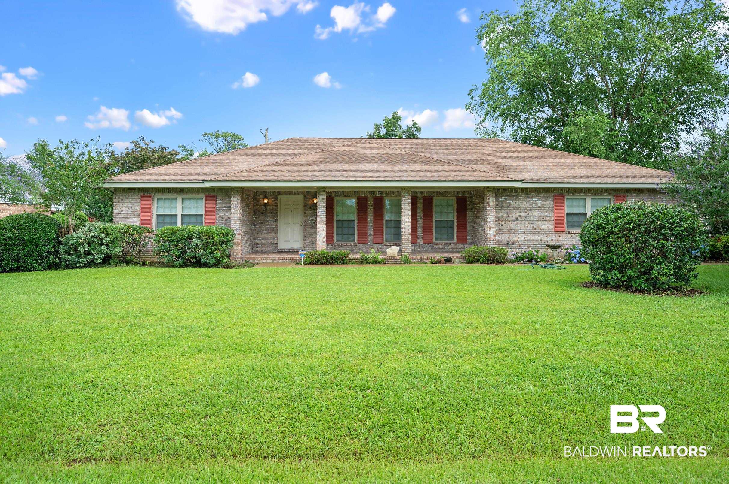 303 West Palm Avenue Foley, AL 36535 - Photo 25 of 32 Single story home featuring a front lawn