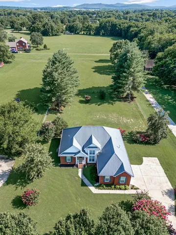 a view of a lake with a yard and lake view
