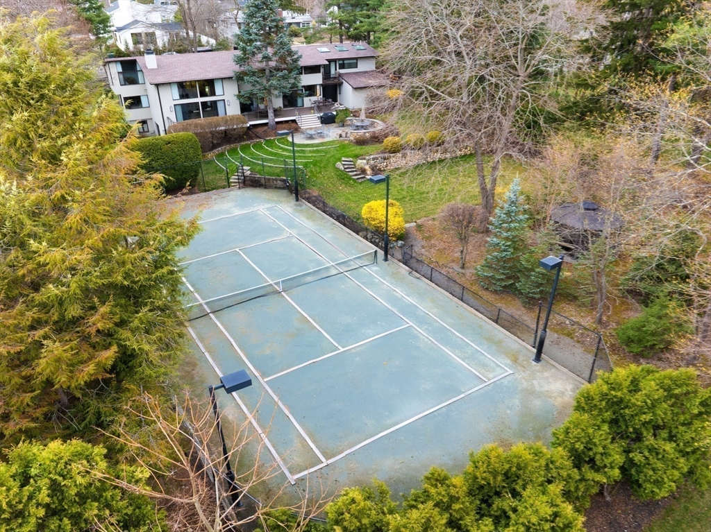 363 Brookline Street Newton, MA 02459 - Photo 30 of 30 a view of a swimming pool with a patio