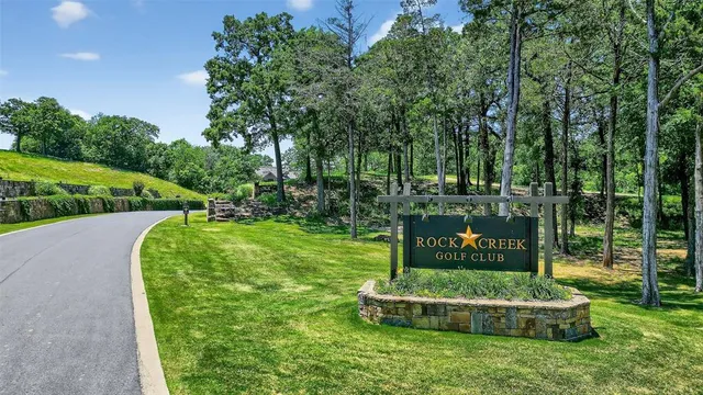 an aerial view of a swimming pool patio and outdoor seating