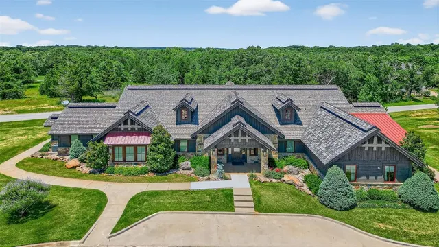 a view of a golf course with parking