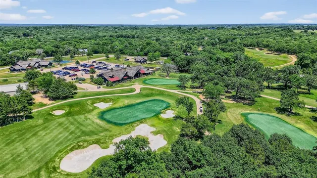 a picture of trees and houses with outdoor space