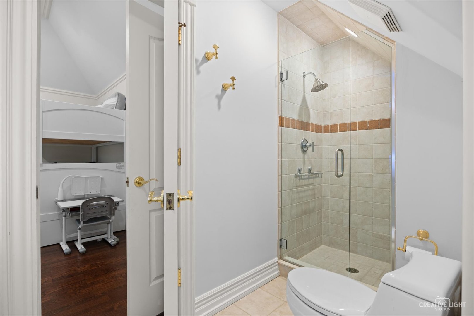 1201 Kenmare Drive Burr Ridge, IL 60527 - Photo 27 of 53 a bathroom with a shower a toilet and a sink