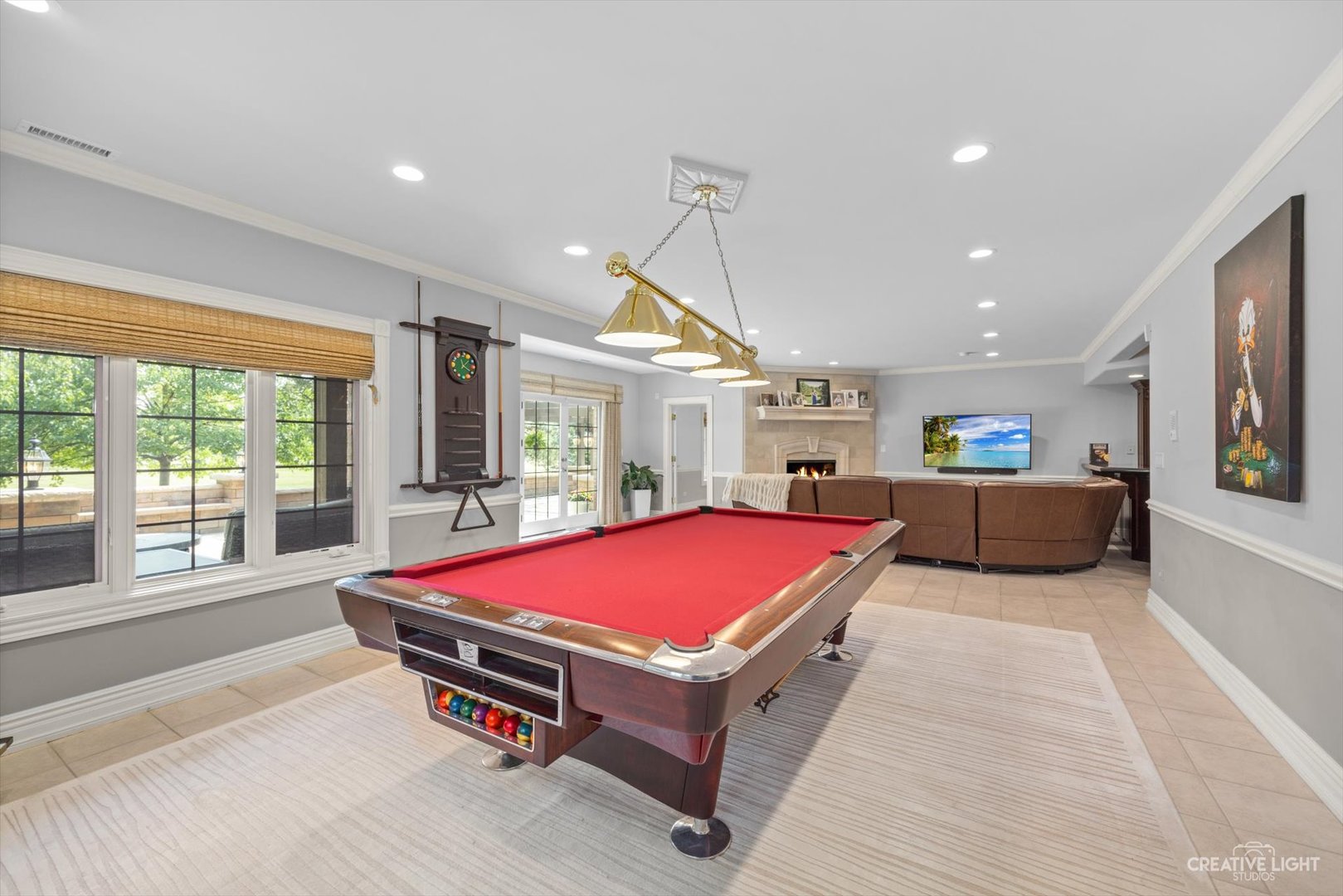 1201 Kenmare Drive Burr Ridge, IL 60527 - Photo 33 of 53 a room with pool table and windows