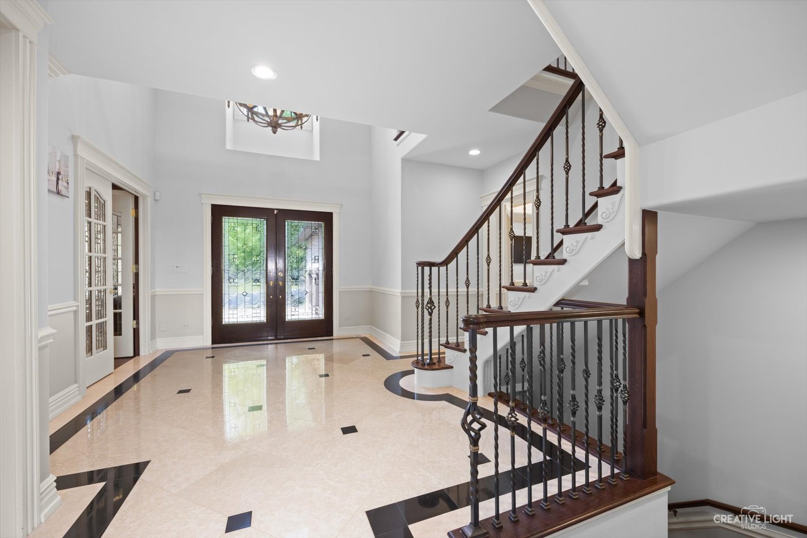 1201 Kenmare Drive Burr Ridge, IL 60527 - Photo 4 of 53 a view of an entryway with wooden floor