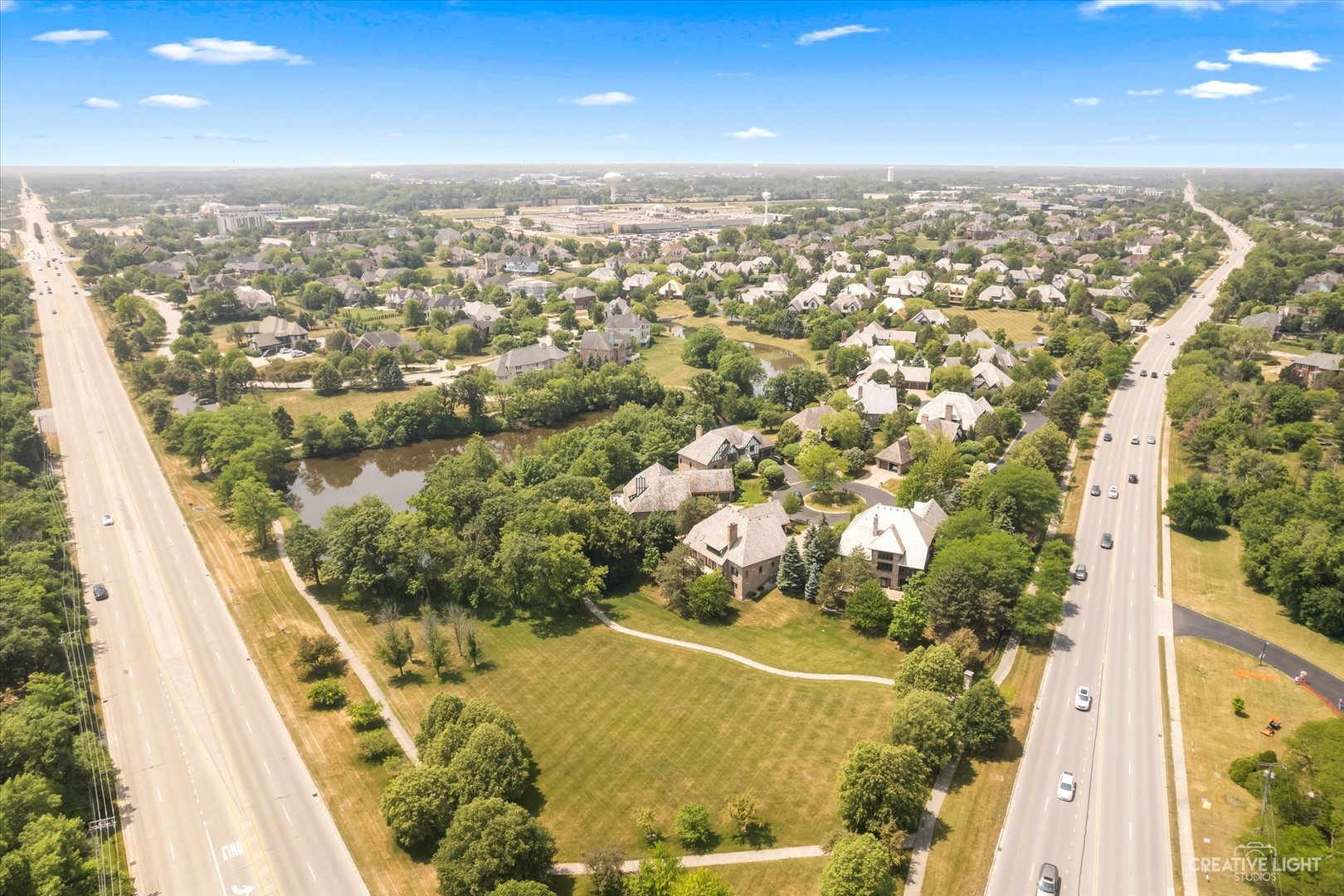 1201 Kenmare Drive Burr Ridge, IL 60527 - Photo 50 of 53 an aerial view of residential houses with outdoor space