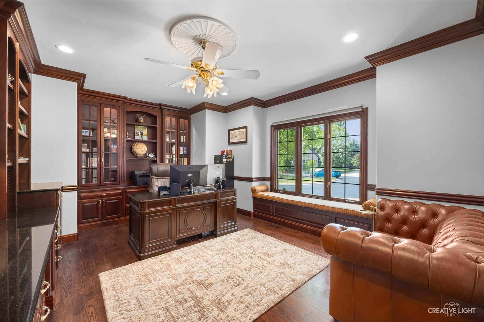 1201 Kenmare Drive Burr Ridge, IL 60527 - Photo 10 of 53 a large living room with a large window