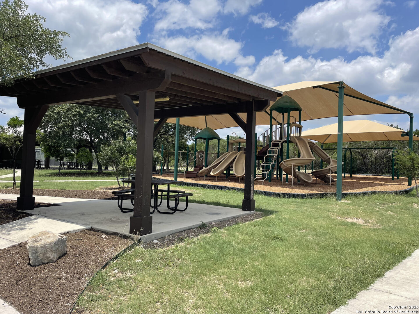 218 PR 1748 Mico, TX 78056 - Photo 6 of 16 a view of a park with slide