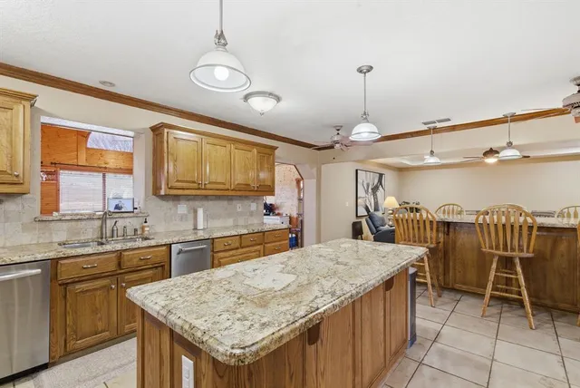 a kitchen with a table and chairs in it