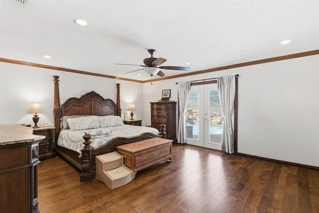 a spacious bedroom with a bed and a walk in closet