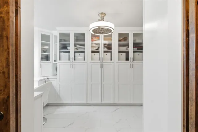 a view of a livingroom with furniture and window