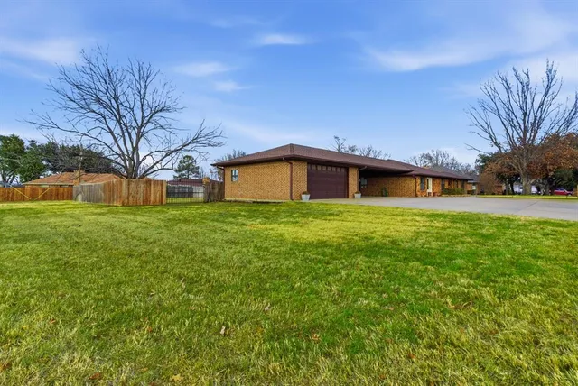a house view with a garden space