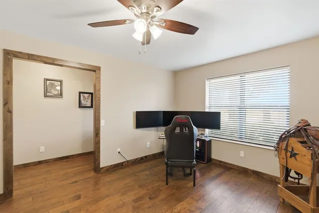 a view of a house with swimming pool and sitting area