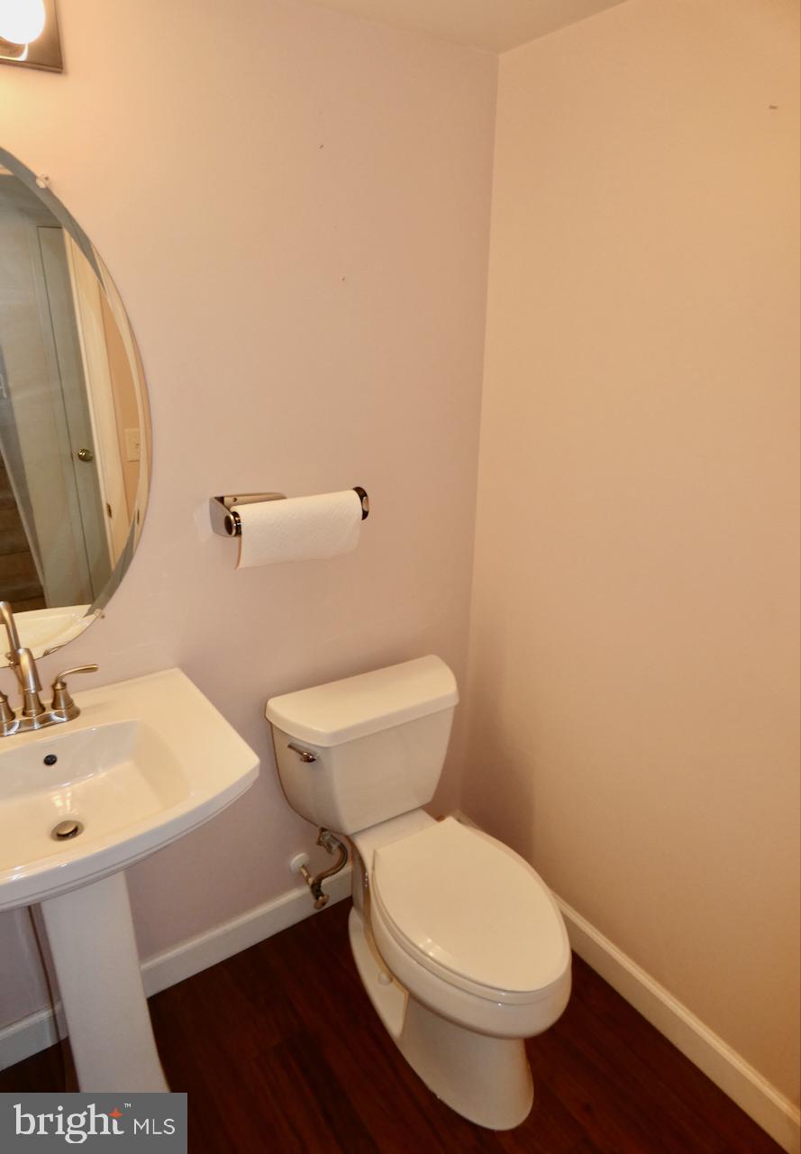 335 Marldale Drive Middletown, DE 19709 - Photo 11 of 58 a white toilet sitting next to a bathroom sink