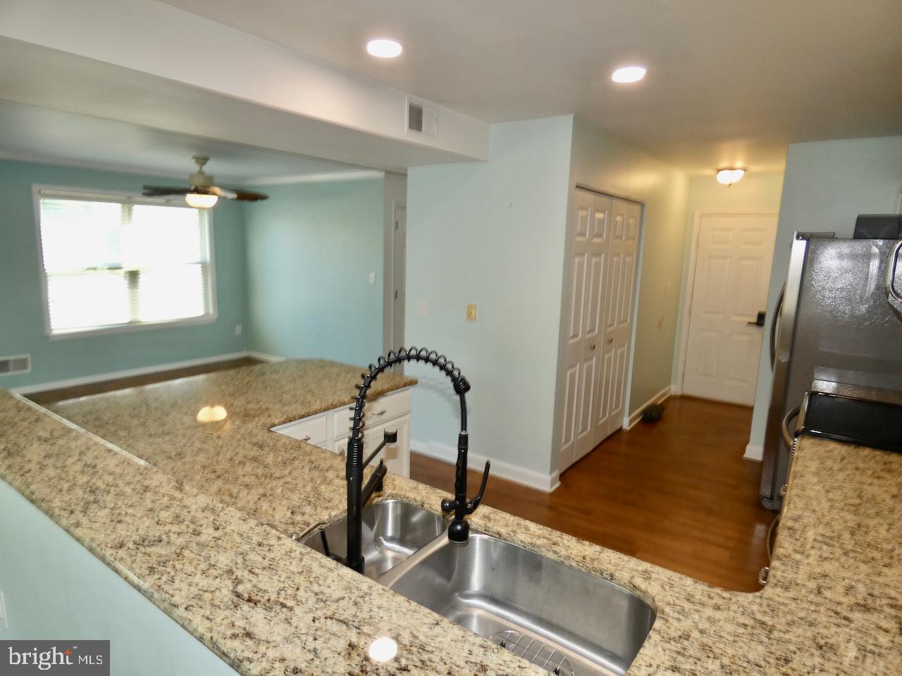335 Marldale Drive Middletown, DE 19709 - Photo 20 of 58 a kitchen with a sink and a refrigerator