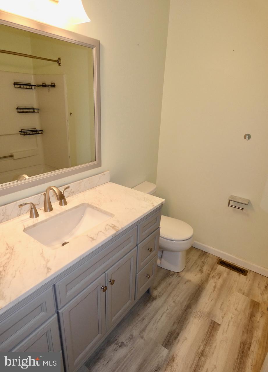 335 Marldale Drive Middletown, DE 19709 - Photo 41 of 58 a bathroom with a sink and a toilet