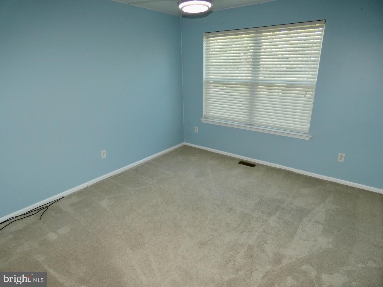 335 Marldale Drive Middletown, DE 19709 - Photo 44 of 58 an empty room with a window