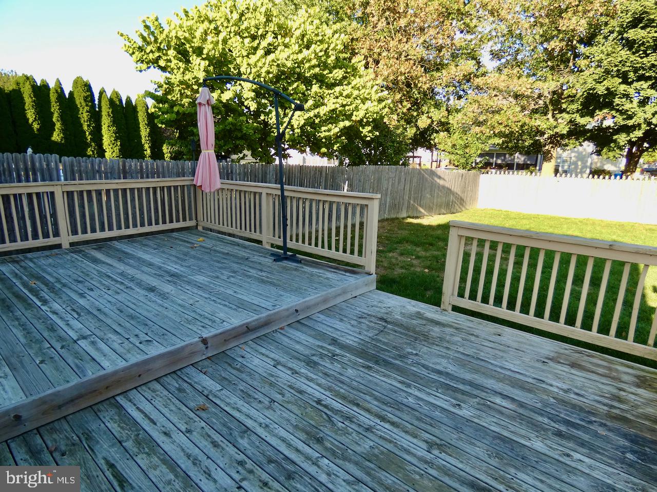 335 Marldale Drive Middletown, DE 19709 - Photo 49 of 58 a view of deck with wooden floor and fence