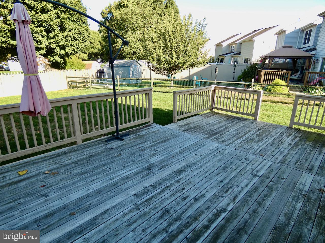 335 Marldale Drive Middletown, DE 19709 - Photo 50 of 58 a view of a house with a wooden deck