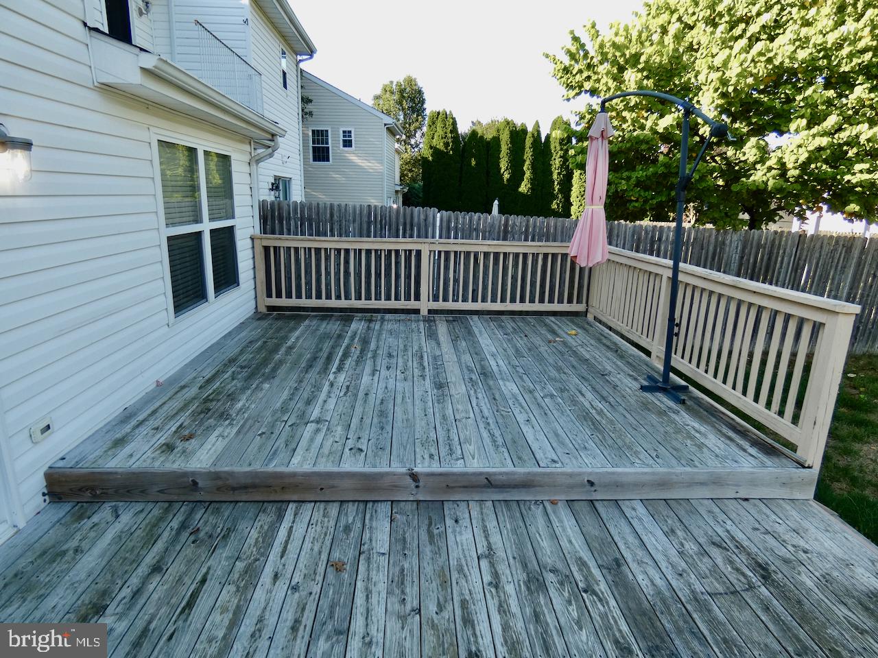 335 Marldale Drive Middletown, DE 19709 - Photo 51 of 58 a view of deck with wooden floor and fence