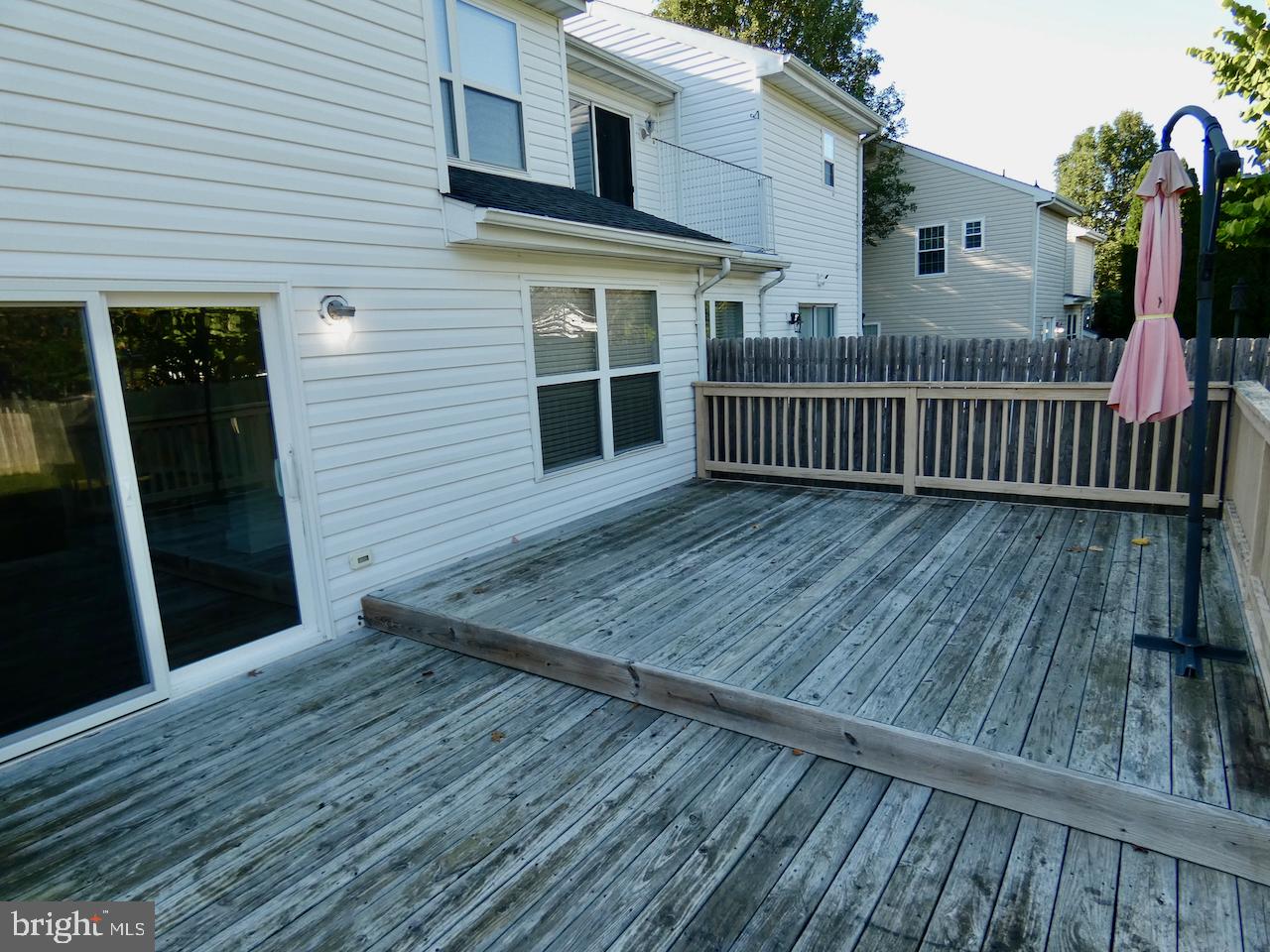 335 Marldale Drive Middletown, DE 19709 - Photo 52 of 58 a view of backyard with deck and wooden floor