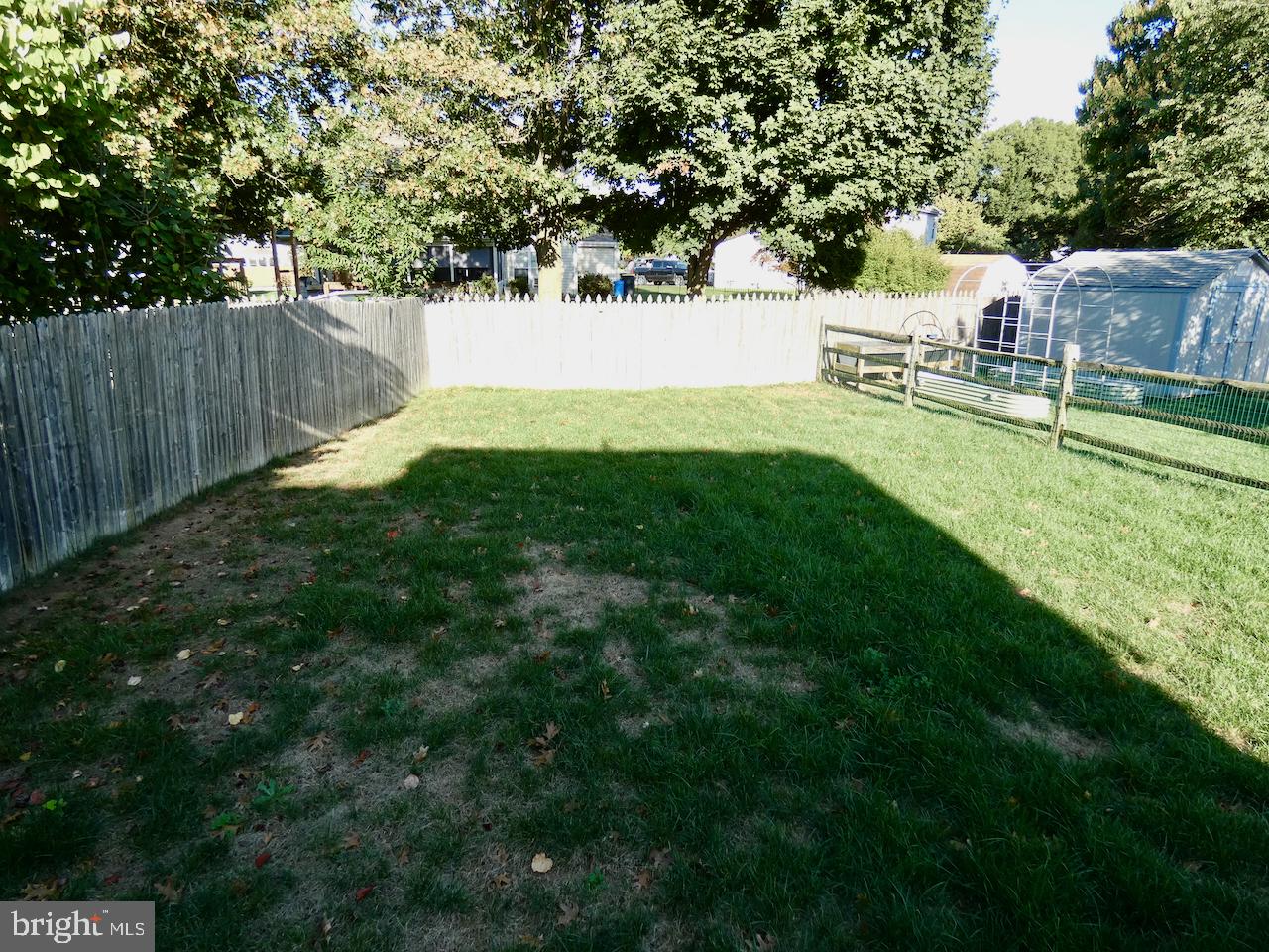 335 Marldale Drive Middletown, DE 19709 - Photo 55 of 58 a view of a backyard with a small house