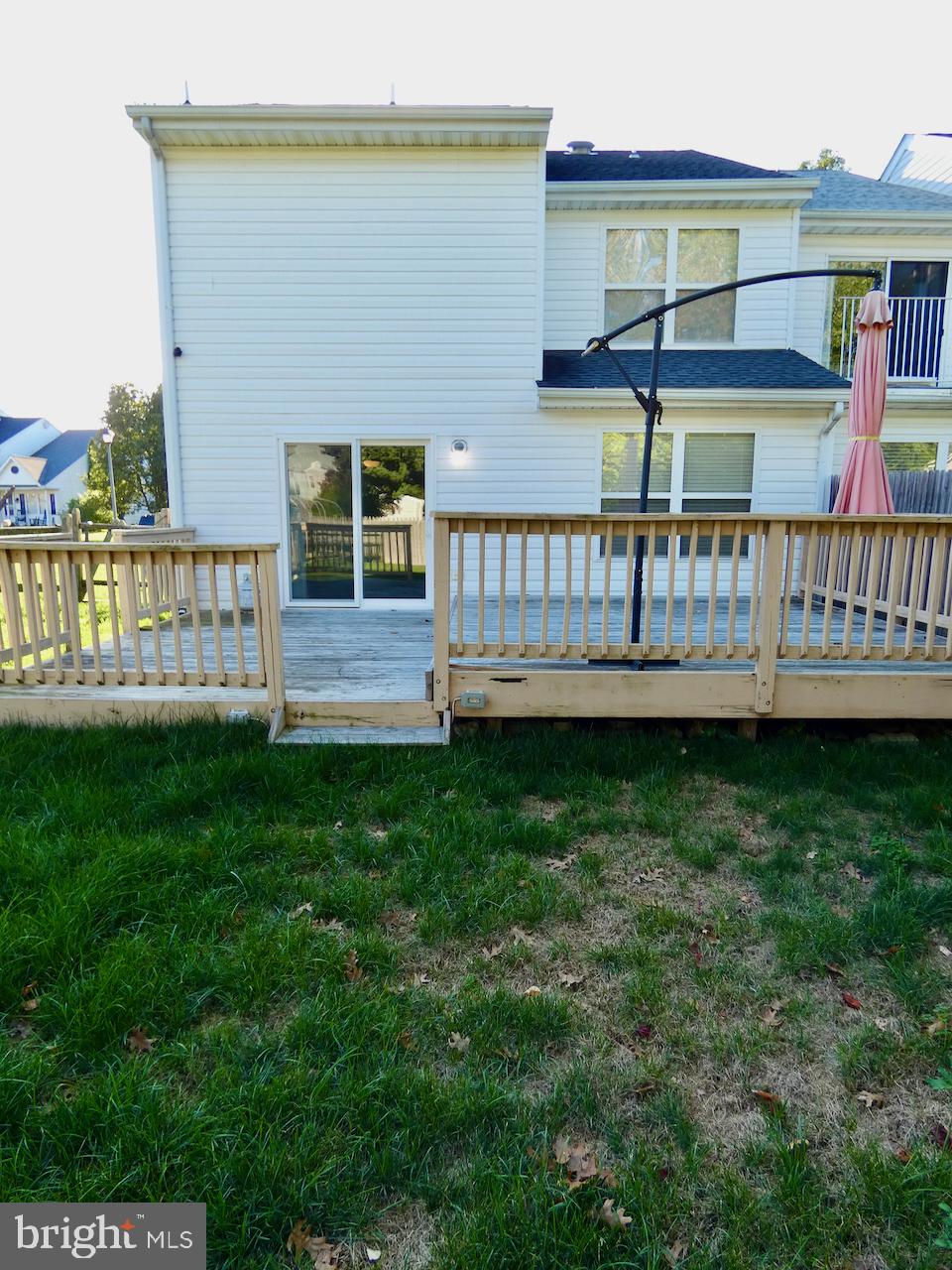 335 Marldale Drive Middletown, DE 19709 - Photo 56 of 58 a view of a house with a wooden deck