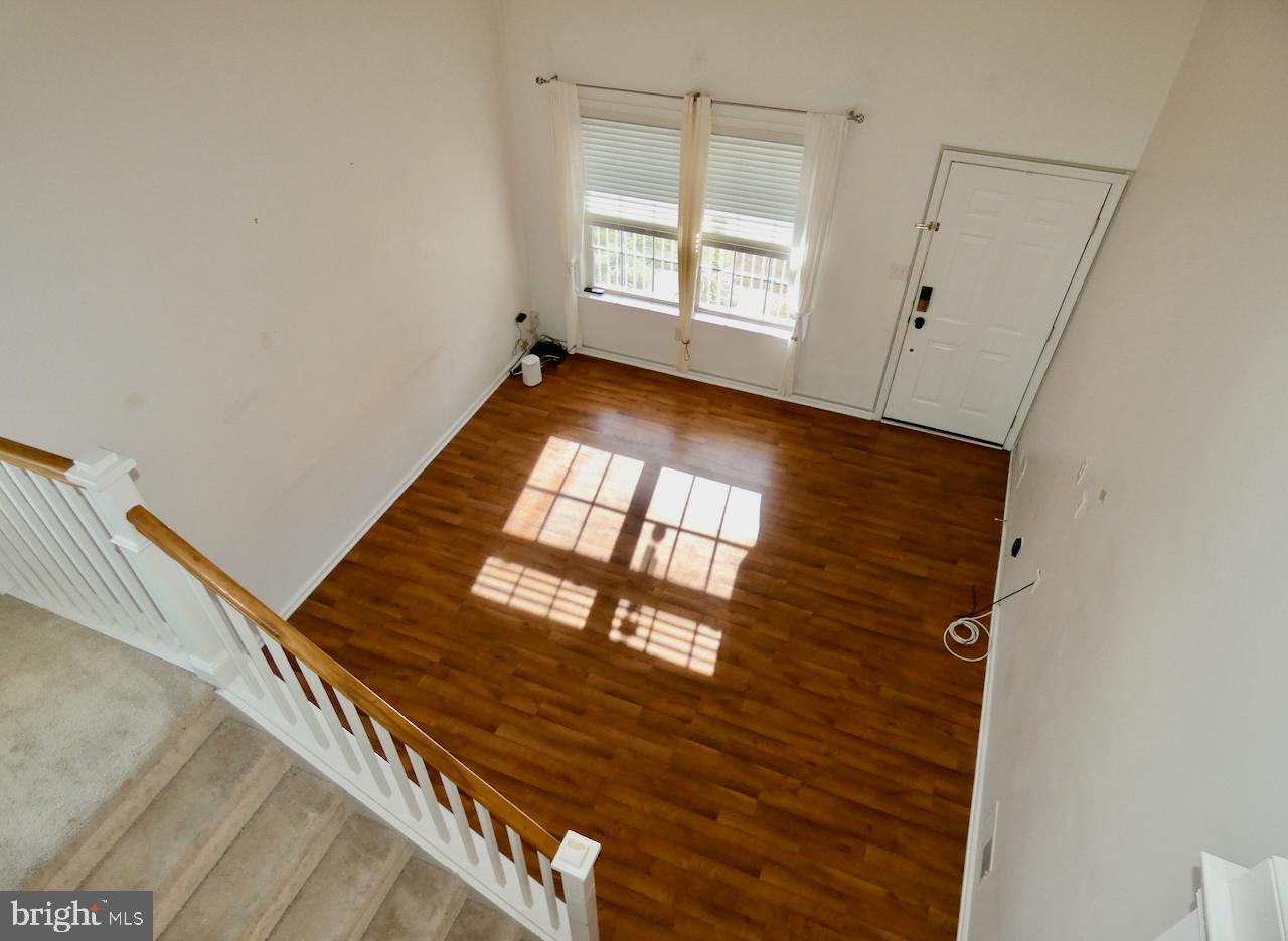 335 Marldale Drive Middletown, DE 19709 - Photo 10 of 58 a view of an empty room with a window