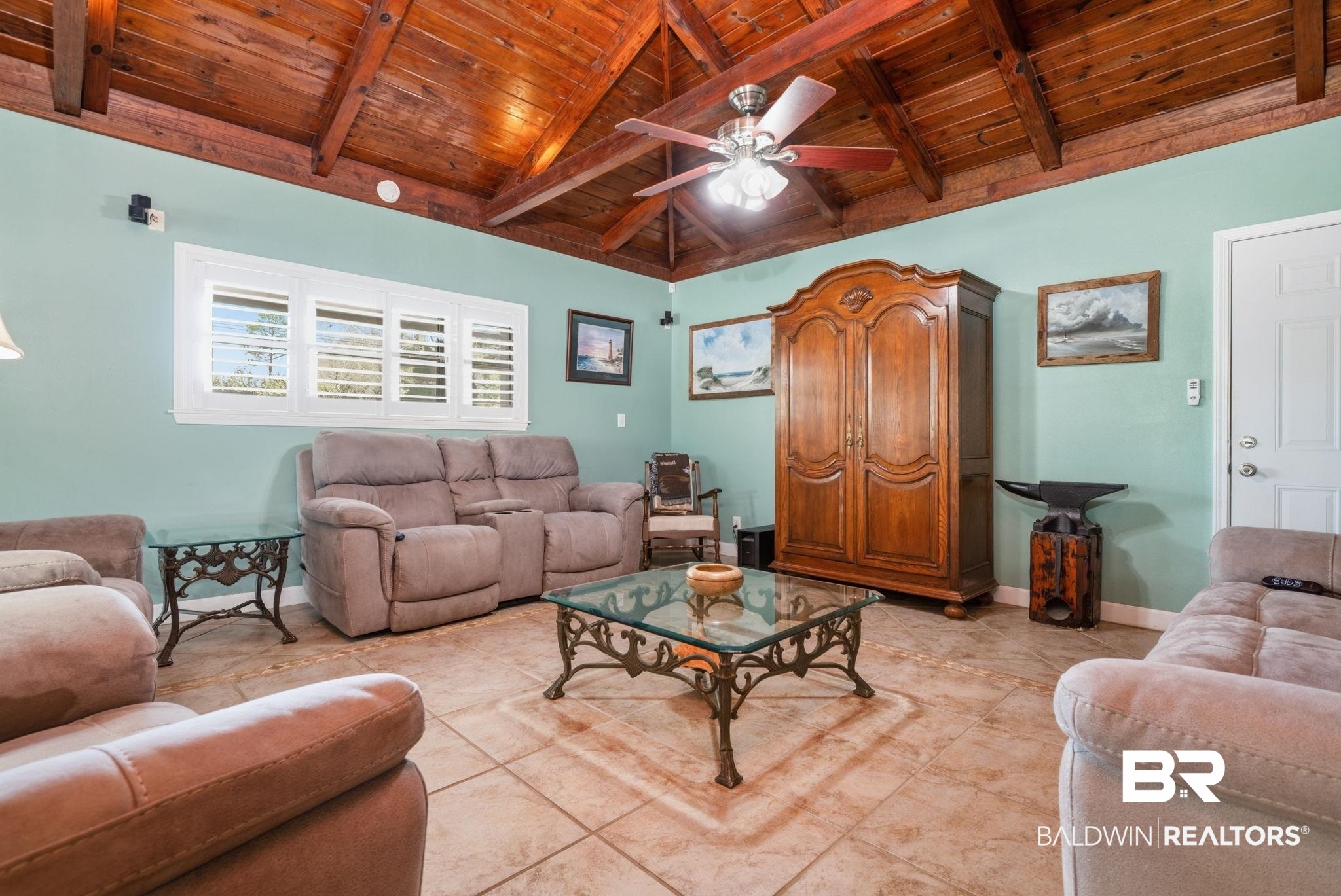 15025 Bellingrath Road Coden, AL 36523 - Photo 35 of 79 Living area with wood ceiling, a ceiling fan, lofted ceiling with beams, and light tile patterned floors