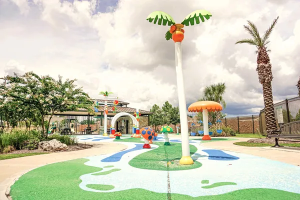a view of a palm tree with an outdoor space