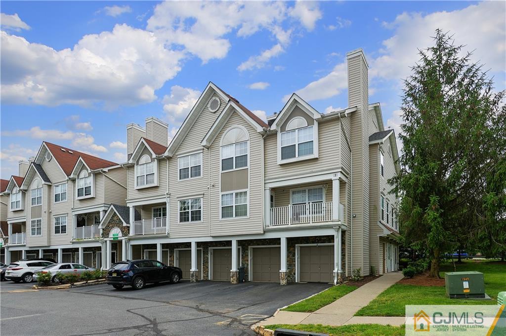 53 Prestwick Way Edison, NJ 08820 - Photo 2 of 28 a front view of a house with garden