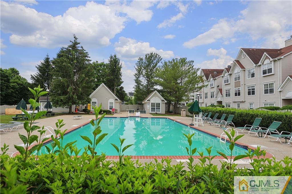 53 Prestwick Way Edison, NJ 08820 - Photo 23 of 28 a view of a house with a yard and sitting area