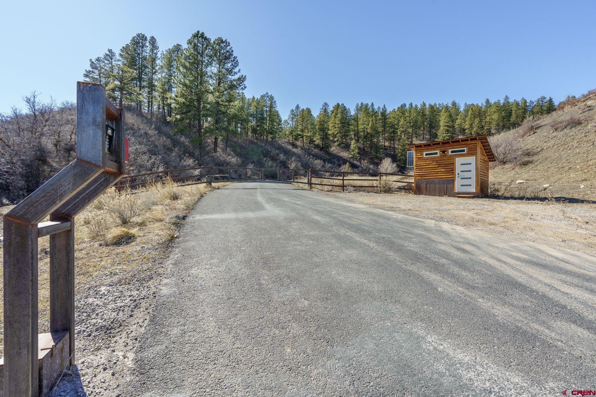 Lot 5 Taylor Ranch Durango, CO 81301 - Photo 7 of 13 a view of a road with a building in the background