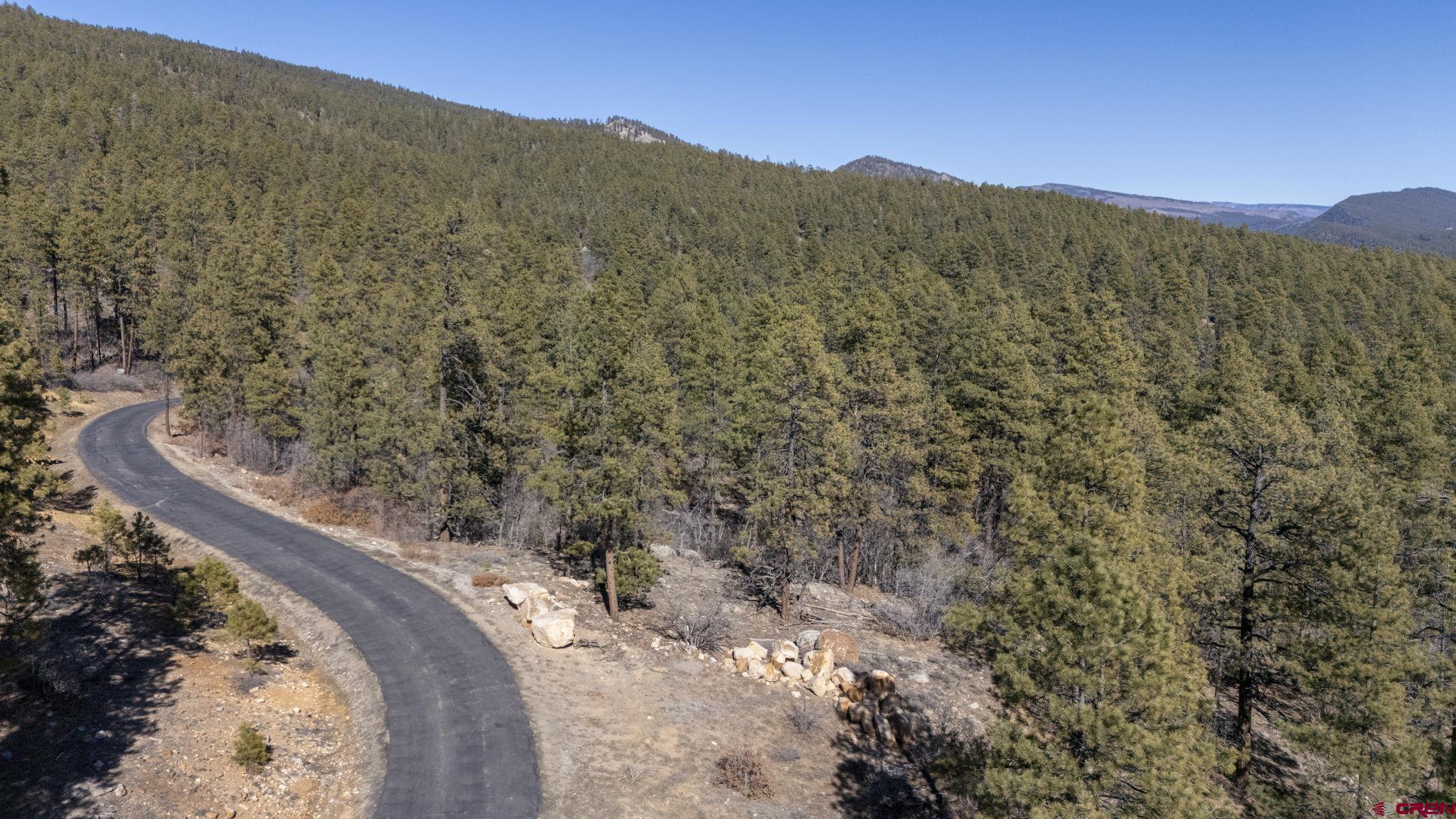 Lot 5 Taylor Ranch Durango, CO 81301 - Photo 10 of 13 a view of a dry yard with mountains in the background