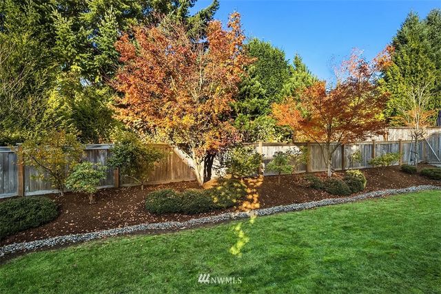 a view of backyard with green space