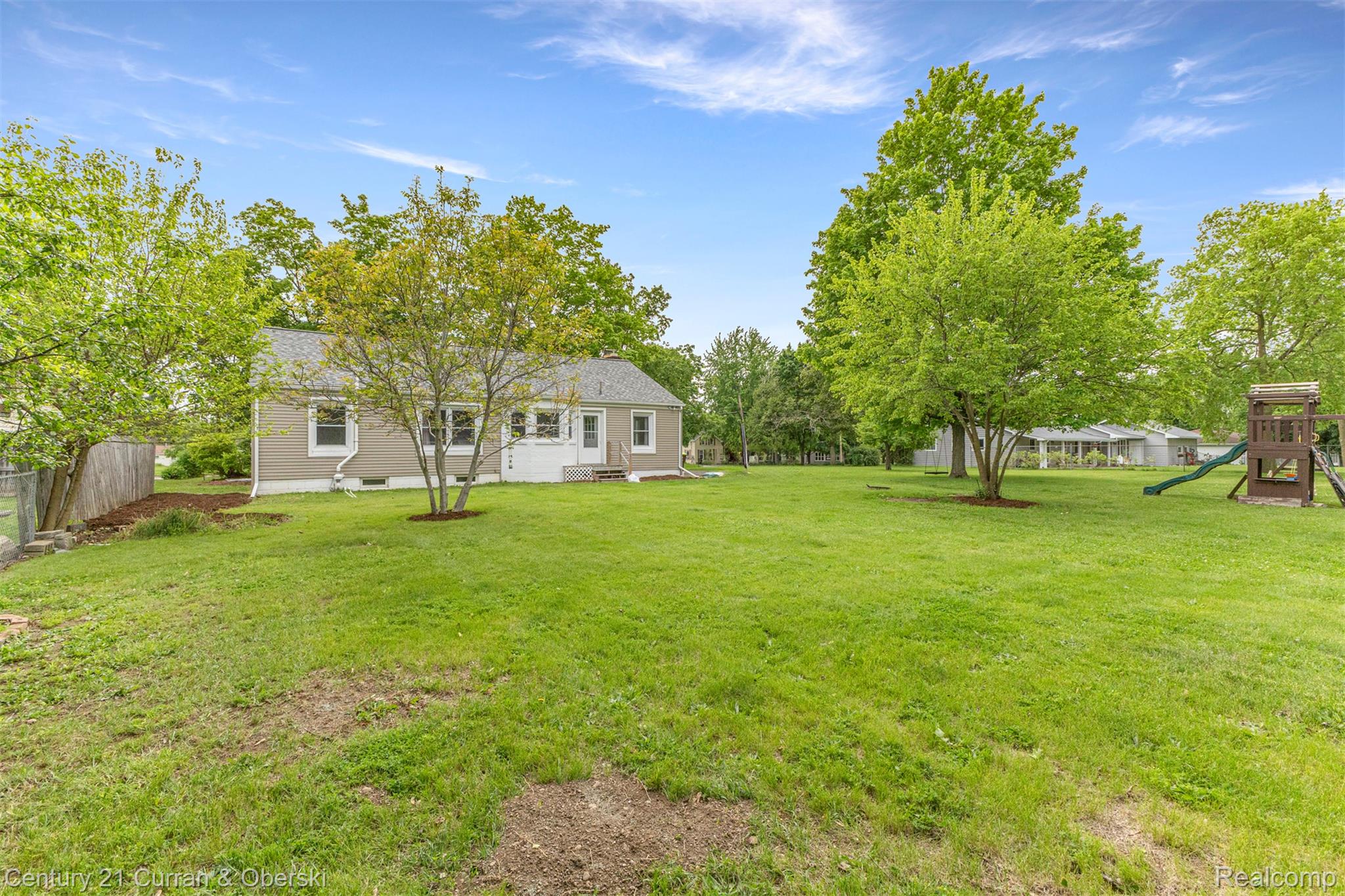 411 South Adrian Street Tecumseh, MI 49286 - Photo 41 of 61 View of green lawn