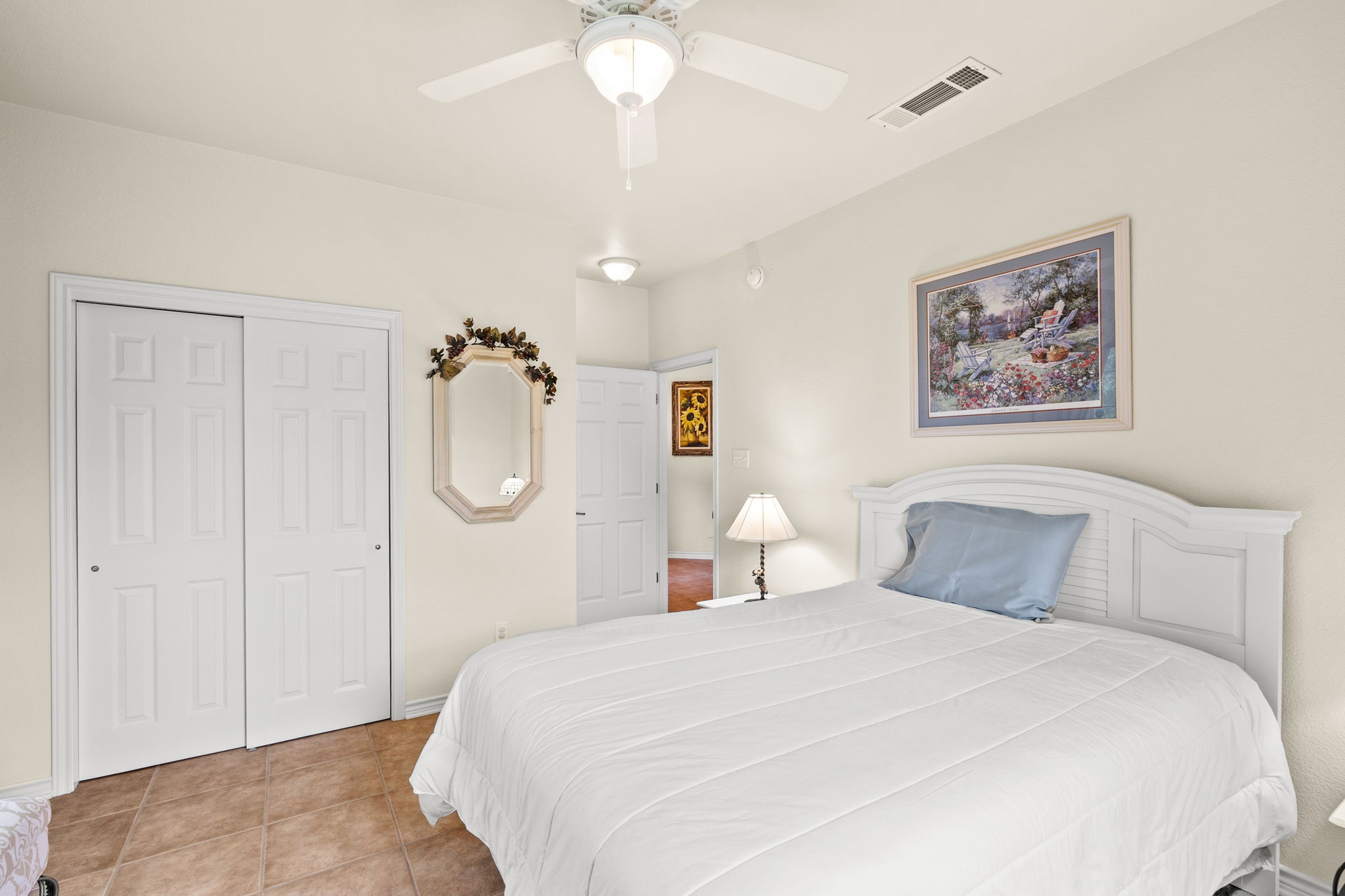 1427 River Ridge Ranch Road Killeen, TX 76549 - Photo 15 of 40 Comfortable bedroom with neutral tones and durable tile flooring, perfect for relaxation.