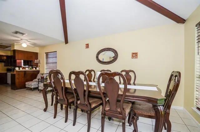 a kitchen with stainless steel appliances granite countertop a sink dishwasher stove and cabinets