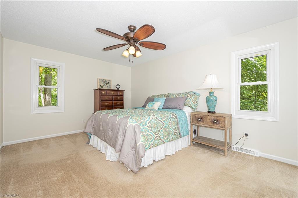 128 Westridge Road Advance, NC 27006 - Photo 15 of 30 The spacious primary bedroom