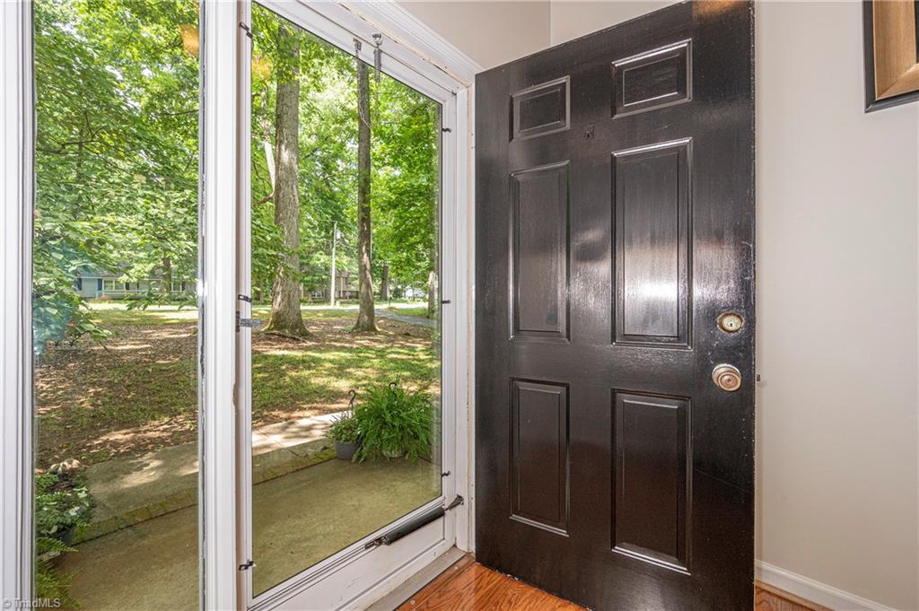 128 Westridge Road Advance, NC 27006 - Photo 5 of 30 The front door is flanked by sidelights creating a welcoming entrance.