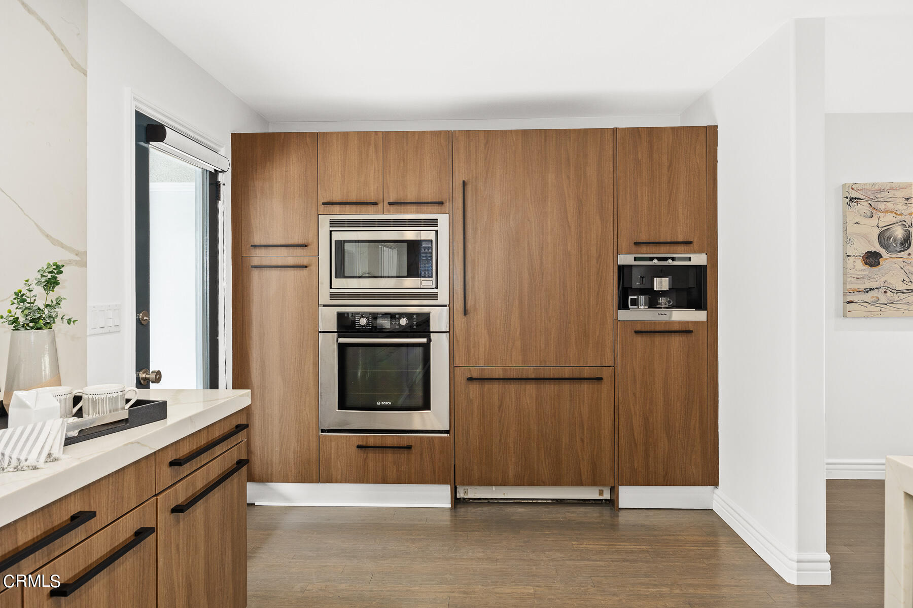 1770 Kaweah Drive Pasadena, CA 91105 - Photo 19 of 42 a kitchen with stainless steel appliances a refrigerator and a stove top oven