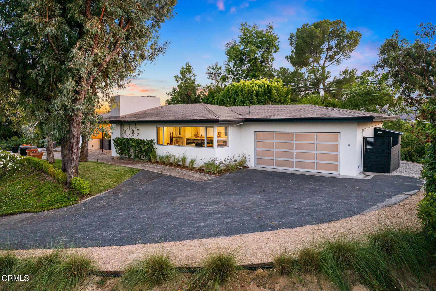 1770 Kaweah Drive Pasadena, CA 91105 - Photo 2 of 42 a front view of a house with a yard and garage