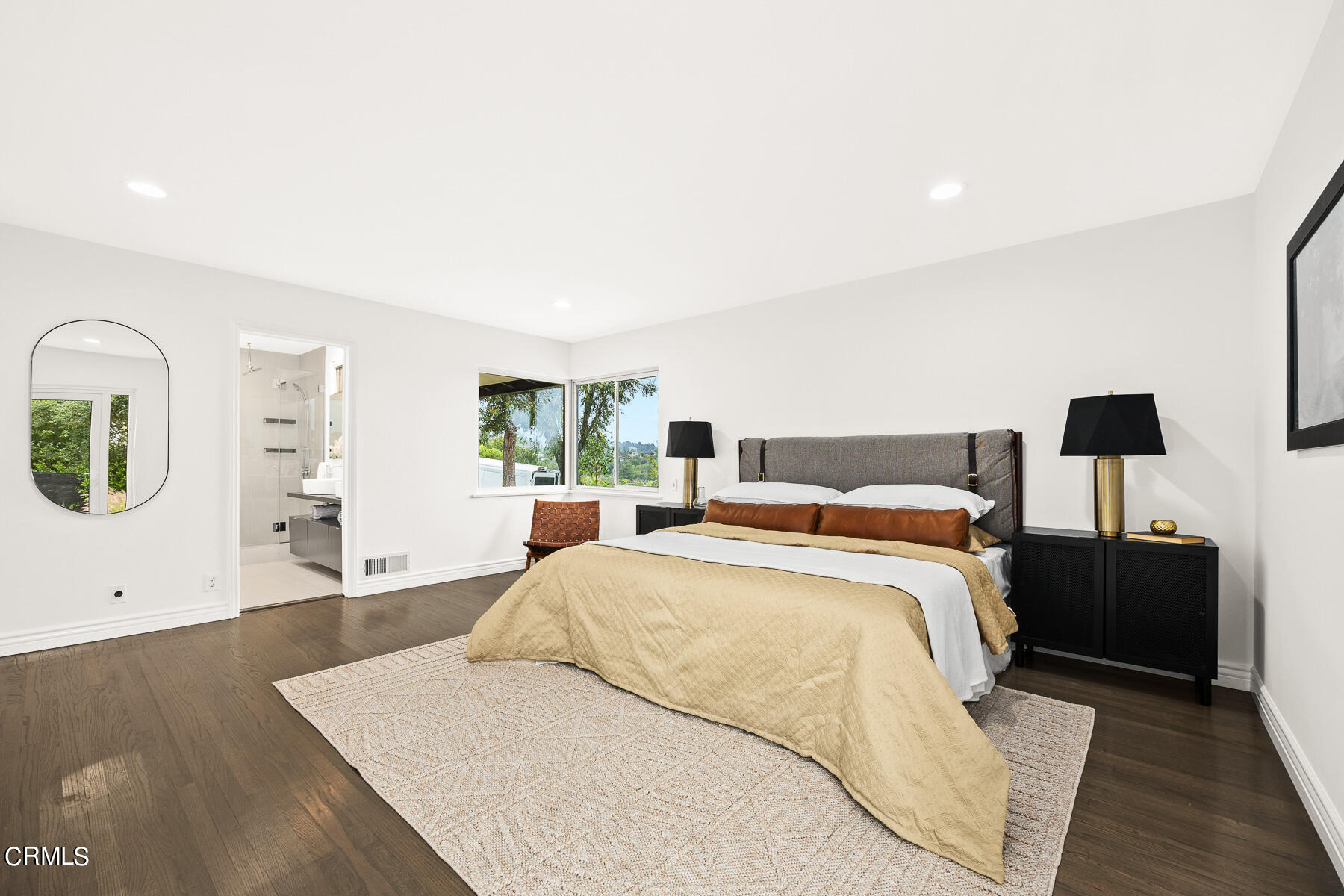 1770 Kaweah Drive Pasadena, CA 91105 - Photo 23 of 42 a large bedroom with a bed and wooden floor